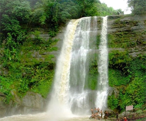 Madhabkunda Waterfall, surrounded by lush greenery in Moulvi Bazar, is a highlight of the Tea Capital Tour.