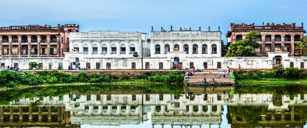 Baliati Zamindar Bari reflected on water, showcasing the historic palaces of Tangail, Bangladesh.